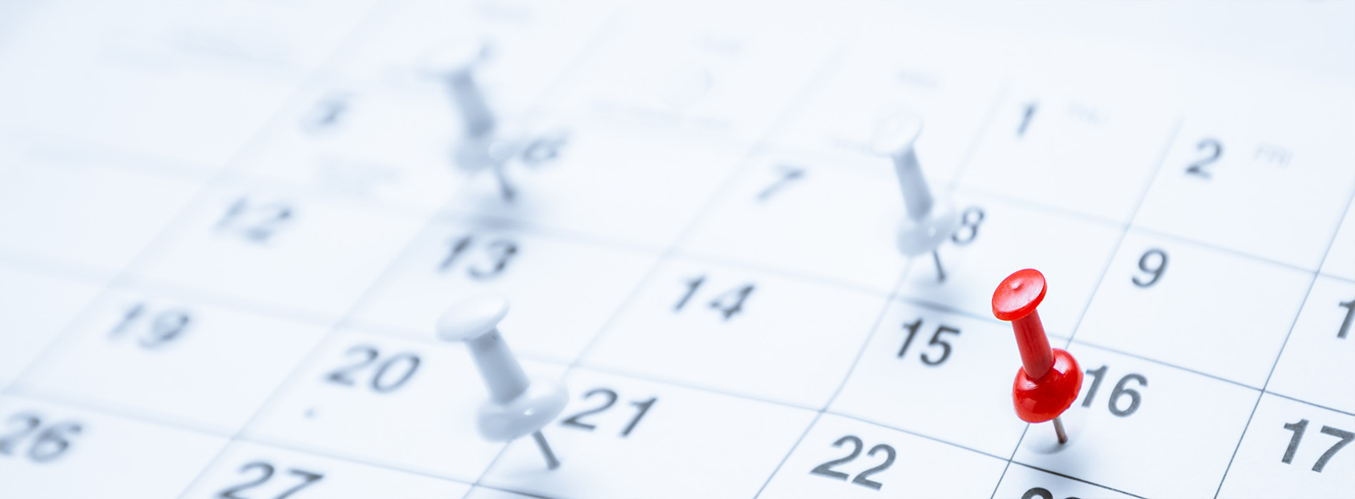 The image shows a close-up of a calendar with the date  16  highlighted, indicating an upcoming event or appointment.