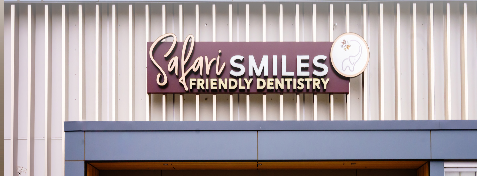 Dental practice sign with the text  SALIS  and  Smiles  in a stylized font, indicating a dental clinic named Salis Smiles.